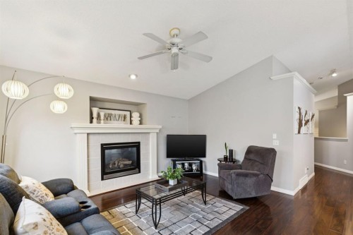 21 Covehaven Gardens Ne, Calgary, AB - Indoor Photo Showing Living Room With Fireplace