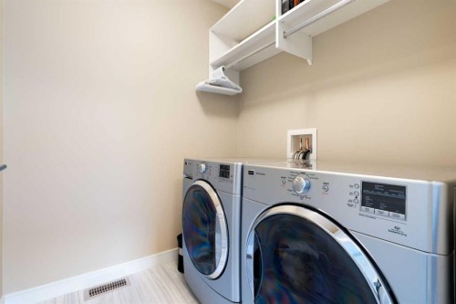3213 Kinsale Road Sw, Calgary, AB - Indoor Photo Showing Laundry Room