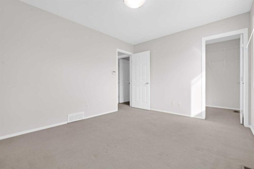 104 Copperstone Terrace Se, Calgary, AB - Indoor Photo Showing Other Room