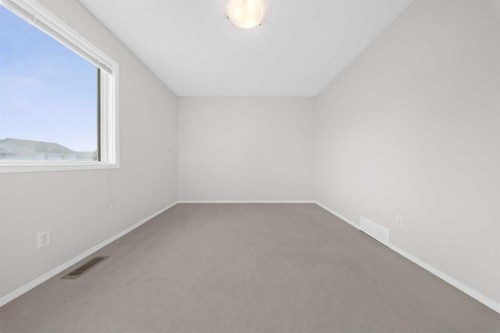 104 Copperstone Terrace Se, Calgary, AB - Indoor Photo Showing Other Room