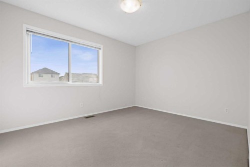 104 Copperstone Terrace Se, Calgary, AB - Indoor Photo Showing Other Room