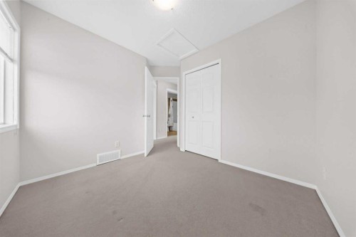 104 Copperstone Terrace Se, Calgary, AB - Indoor Photo Showing Other Room
