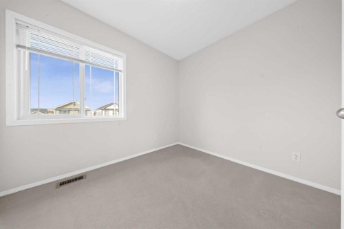 104 Copperstone Terrace Se, Calgary, AB - Indoor Photo Showing Other Room