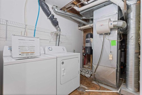104 Copperstone Terrace Se, Calgary, AB - Indoor Photo Showing Laundry Room