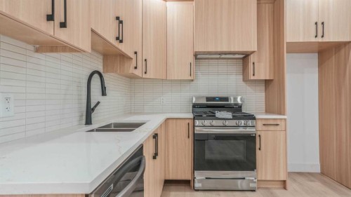 8924 34 Avenue, Calgary, AB - Indoor Photo Showing Kitchen With Double Sink With Upgraded Kitchen