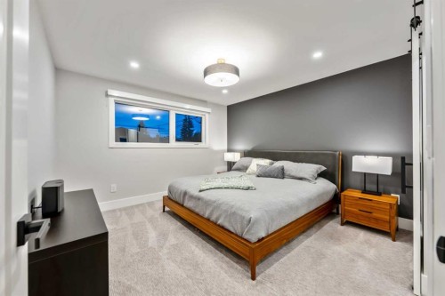 100 Lake Crimson Close Se, Calgary, AB - Indoor Photo Showing Bedroom