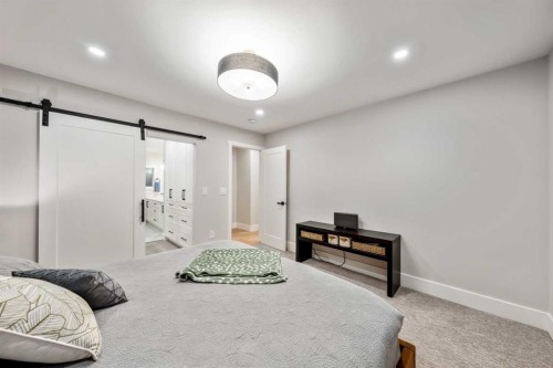 100 Lake Crimson Close Se, Calgary, AB - Indoor Photo Showing Bedroom