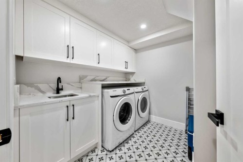 100 Lake Crimson Close Se, Calgary, AB - Indoor Photo Showing Laundry Room