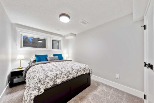 100 Lake Crimson Close Se, Calgary, AB - Indoor Photo Showing Bedroom