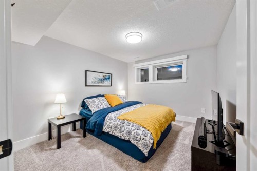 100 Lake Crimson Close Se, Calgary, AB - Indoor Photo Showing Bedroom