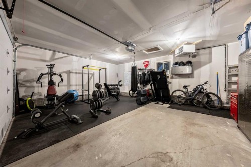 100 Lake Crimson Close Se, Calgary, AB - Indoor Photo Showing Gym Room