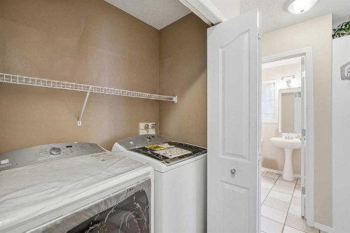 52 Douglas Glen Crescent Se, Calgary, AB - Indoor Photo Showing Laundry Room