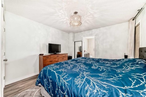 485 Cimarron Boulevard, Okotoks, AB - Indoor Photo Showing Bedroom