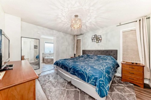 485 Cimarron Boulevard, Okotoks, AB - Indoor Photo Showing Bedroom