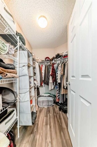 485 Cimarron Boulevard, Okotoks, AB - Indoor With Storage