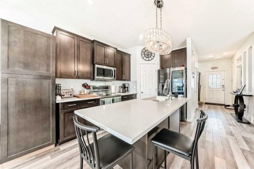 485 Cimarron Boulevard, Okotoks, AB - Indoor Photo Showing Kitchen With Stainless Steel Kitchen With Upgraded Kitchen
