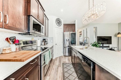 485 Cimarron Boulevard, Okotoks, AB - Indoor Photo Showing Kitchen With Stainless Steel Kitchen With Upgraded Kitchen