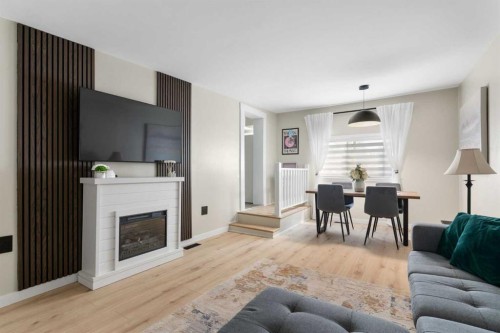 222 45 Avenue West, Claresholm, AB - Indoor Photo Showing Living Room With Fireplace