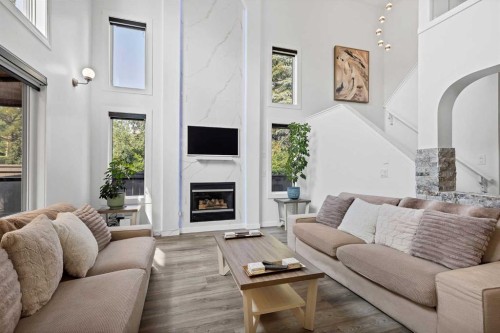 11 Citadel Meadow Grove Nw, Calgary, AB - Indoor Photo Showing Living Room With Fireplace