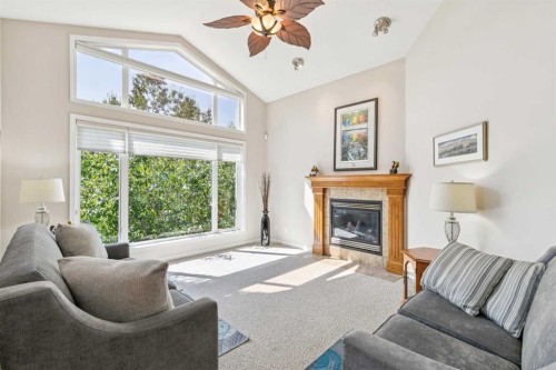 7 Wentworth Landing Sw, Calgary, AB - Indoor Photo Showing Living Room With Fireplace