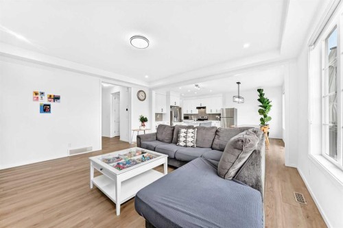 149 Carrington Crescent Nw, Calgary, AB - Indoor Photo Showing Living Room