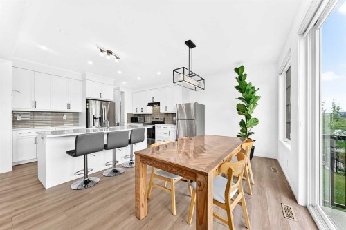 149 Carrington Crescent Nw, Calgary, AB - Indoor Photo Showing Kitchen With Upgraded Kitchen