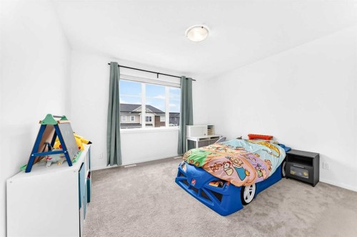 149 Carrington Crescent Nw, Calgary, AB - Indoor Photo Showing Bedroom
