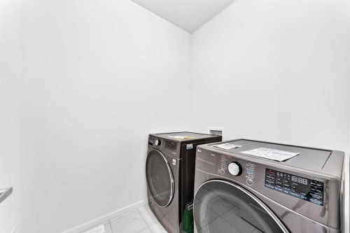 149 Carrington Crescent Nw, Calgary, AB - Indoor Photo Showing Laundry Room