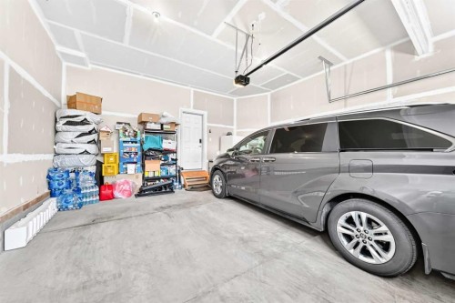 149 Carrington Crescent Nw, Calgary, AB - Indoor Photo Showing Garage
