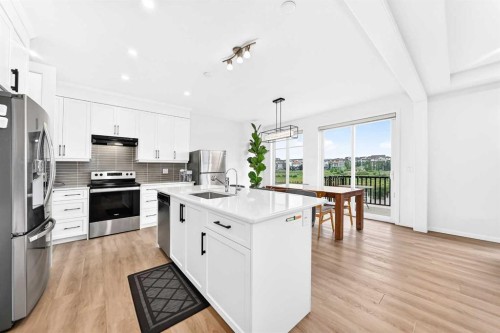 149 Carrington Crescent Nw, Calgary, AB - Indoor Photo Showing Kitchen With Upgraded Kitchen
