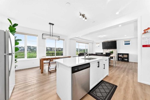 149 Carrington Crescent Nw, Calgary, AB - Indoor Photo Showing Kitchen With Upgraded Kitchen