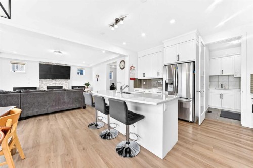 149 Carrington Crescent Nw, Calgary, AB - Indoor Photo Showing Kitchen With Upgraded Kitchen