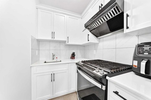 149 Carrington Crescent Nw, Calgary, AB - Indoor Photo Showing Kitchen With Upgraded Kitchen