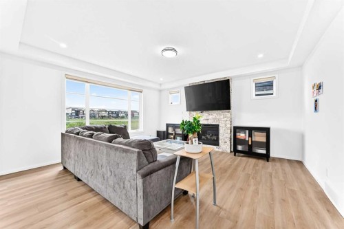 149 Carrington Crescent Nw, Calgary, AB - Indoor Photo Showing Living Room With Fireplace