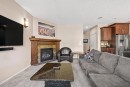 16 Cranarch Grove Se, Calgary, AB  - Indoor Photo Showing Living Room With Fireplace 