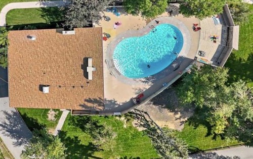 503-8948 Elbow Drive Sw, Calgary, AB - Outdoor With In Ground Pool
