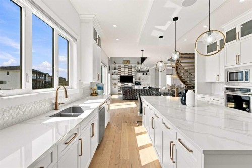 201 Milton Road, Conrich, AB - Indoor Photo Showing Kitchen With Double Sink With Upgraded Kitchen