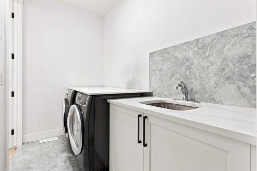 201 Milton Road, Conrich, AB - Indoor Photo Showing Laundry Room