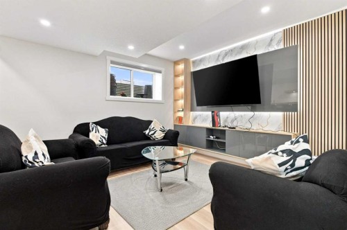 201 Milton Road, Conrich, AB - Indoor Photo Showing Living Room