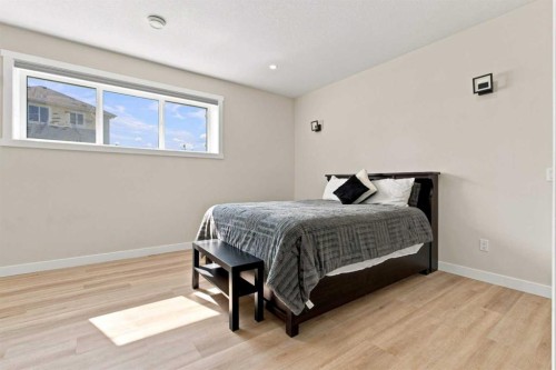 201 Milton Road, Conrich, AB - Indoor Photo Showing Bedroom
