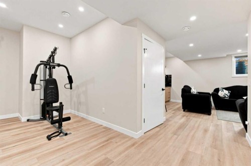 201 Milton Road, Conrich, AB - Indoor Photo Showing Gym Room