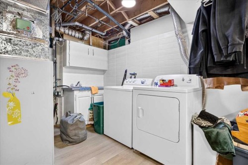 80 Templevale Way Ne, Calgary, AB - Indoor Photo Showing Laundry Room
