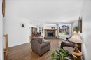 80 Templevale Way Ne, Calgary, AB  - Indoor Photo Showing Living Room With Fireplace 