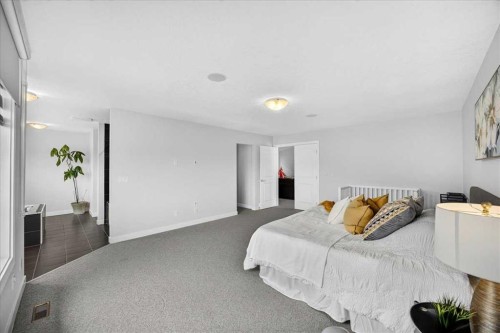 546 Sherwood Boulevard Nw, Calgary, AB - Indoor Photo Showing Bedroom