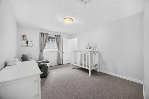 546 Sherwood Boulevard Nw, Calgary, AB - Indoor Photo Showing Bedroom