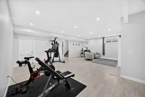 546 Sherwood Boulevard Nw, Calgary, AB - Indoor Photo Showing Gym Room