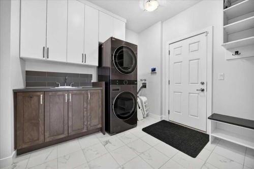 546 Sherwood Boulevard Nw, Calgary, AB - Indoor Photo Showing Laundry Room