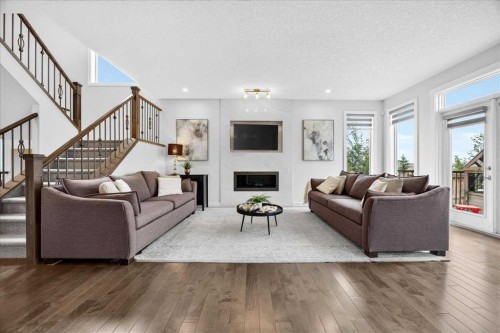 546 Sherwood Boulevard Nw, Calgary, AB - Indoor Photo Showing Living Room With Fireplace