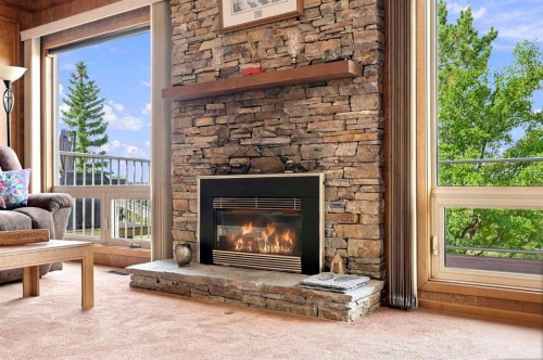 1148 Edgemont Road Nw, Calgary, AB - Indoor Photo Showing Living Room With Fireplace
