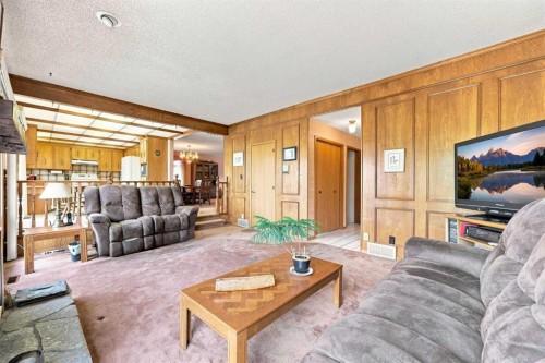 1148 Edgemont Road Nw, Calgary, AB - Indoor Photo Showing Living Room